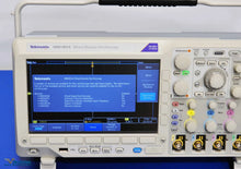Load image into Gallery viewer, Tektronix MDO3014 100MHz Mixed Domain Oscilloscope - 4 Channel, Calibrated, 2.5GS/s