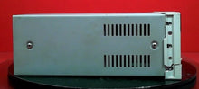 Load image into Gallery viewer, Agilent E3631A Triple Output DC Power Supply 0-6V/5A, 0-25V/1A - ZYYKZ Test Equipment