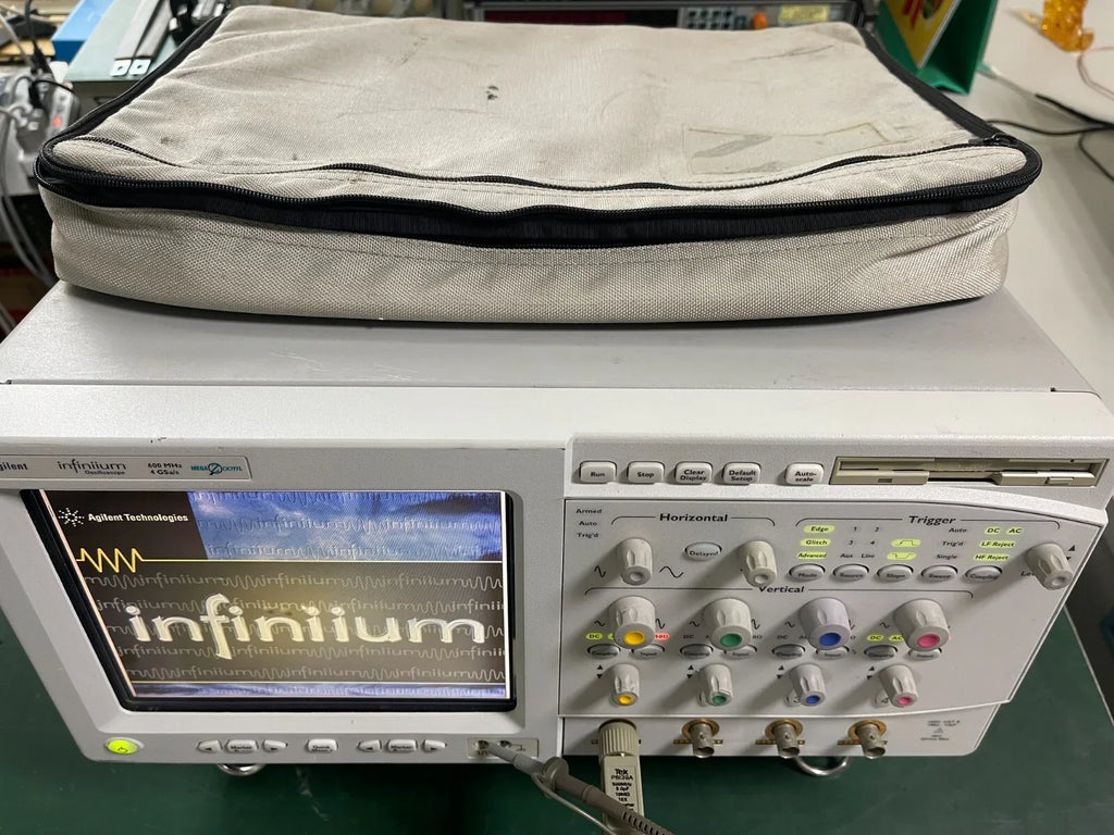 Agilent Infiniium 54831B 600MHz 4GSa/s Digital Oscilloscope with P6139A Probe & 1160 Series Accessories - ZYYKZ Test Equipment