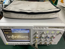 Load image into Gallery viewer, Agilent Infiniium 54831B 600MHz 4GSa/s Digital Oscilloscope with P6139A Probe &amp; 1160 Series Accessories - ZYYKZ Test Equipment
