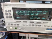 Load image into Gallery viewer, HP Agilent 83630A/83620A Signal Generator 10 MHz–24.5 GHz with Options 1, 6, 8 - ZYYKZ Test Equipment