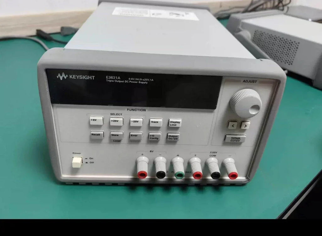 Agilent Keysight E3631A Triple Output Programmable DC Power Supply 0-6V/5A, 0-25V/1A - ZYYKZ Test Equipment