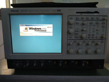 Load image into Gallery viewer, Tektronix TDS7404 Digital Phosphor Oscilloscope 4 GHz, 4 Channels - ZYYKZ Test Equipment