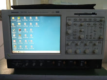 Load image into Gallery viewer, Tektronix TDS7404 Digital Phosphor Oscilloscope - 4 Channels, 4GHz Bandwidth, 20 GS/s Sample Rate - ZYYKZ Test Equipment