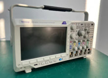 Load image into Gallery viewer, Tektronix MDO3014 4-Channel Mixed Domain Oscilloscope 100 MHz Bandwidth 2.5 GS/s Sample Rate - ZYYKZ Test Equipment