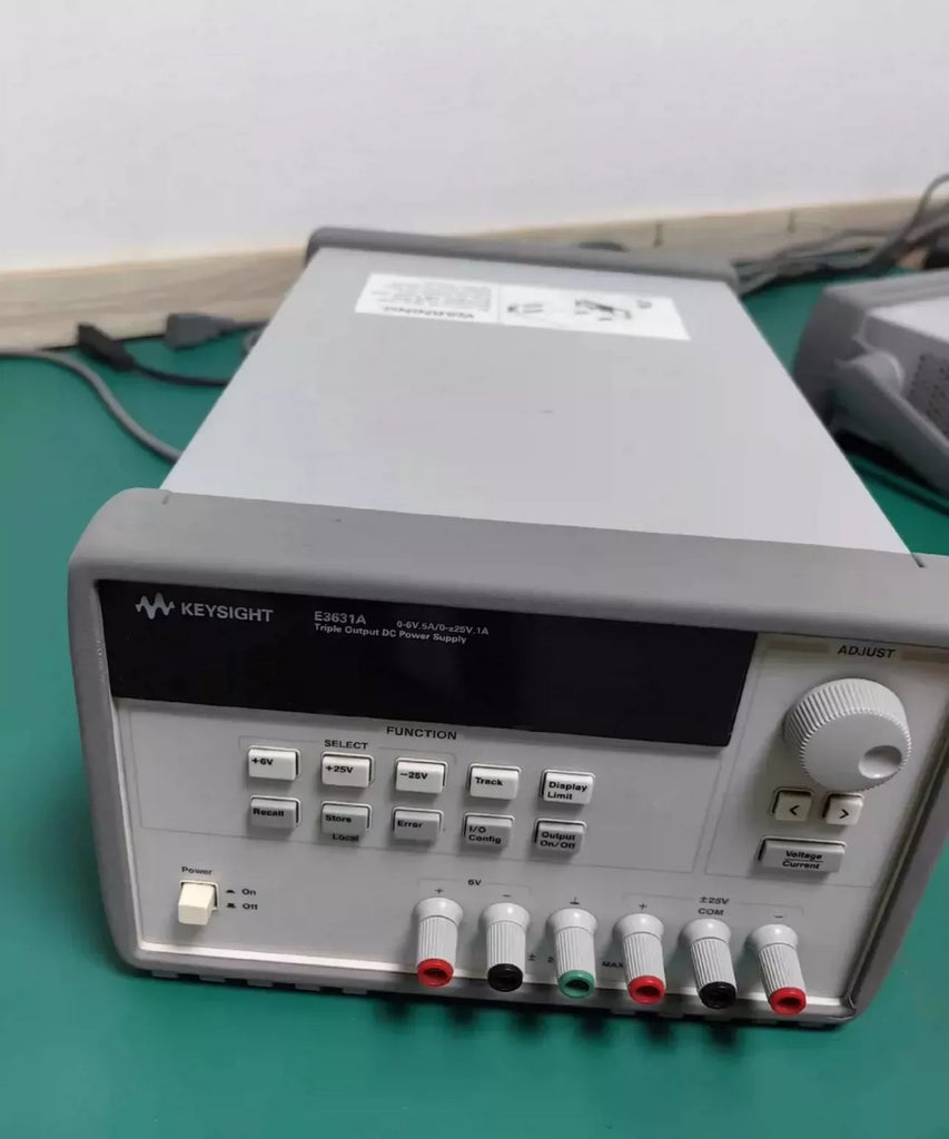 Agilent Keysight E3631A Triple Output Programmable DC Power Supply 0-6V/5A, 0-25V/1A - ZYYKZ Test Equipment