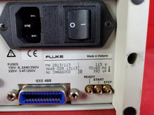 Load image into Gallery viewer, Fluke PM2813 Triple Output DC Power Supply 60 V / 5 A / 180 W - ZYYKZ Test Equipment