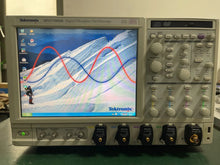 Load image into Gallery viewer, Tektronix DPO71604B 16GHz 4-Channel Digital Phosphor Oscilloscope 50GS/s - ZYYKZ Test Equipment
