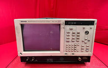 Load image into Gallery viewer, Tektronix RSA6114A Real-Time Spectrum Analyzer 9 kHz–14 GHz with Advanced Options - ZYYKZ Test Equipment
