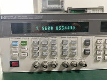 Load image into Gallery viewer, Agilent 83731B Synthesized Signal Generator 1 GHz to 20 GHz - ZYYKZ Test Equipment
