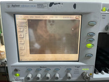 Load image into Gallery viewer, Agilent 86100A Infiniium Wide-Bandwidth Digital Communication Analyzer Oscilloscope - ZYYKZ Test Equipment