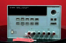 Load image into Gallery viewer, Agilent E3631A Triple Output DC Power Supply 0-6V/5A, 0-25V/1A - ZYYKZ Test Equipment