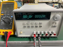Load image into Gallery viewer, Agilent E3631A Triple Output Programmable DC Power Supply 0-6V/5A &amp; 0-25V/1A - ZYYKZ Test Equipment
