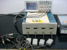 Load image into Gallery viewer, Tektronix A6907 4-Channel DC-60MHz Differential Isolator - ZYYKZ Test Equipment