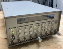Load image into Gallery viewer, Stanford Research DG535 High-Precision Digital Delay and Pulse Generator with Calibration Data - ZYYKZ Test Equipment