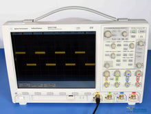 Load image into Gallery viewer, Agilent Keysight MSO7104B Mixed Signal Oscilloscope - 1.5 GHz, 6.25 GS/s, Calibrated
