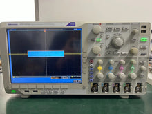 Load image into Gallery viewer, Tektronix DPO4034B 350MHz 4-Channel Digital Phosphor Oscilloscope, 2.5GS/s - ZYYKZ Test Equipment