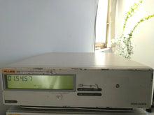 Load image into Gallery viewer, Fluke 910 GPS Controlled OCXO Frequency Standard Clock - ZYYKZ Test Equipment