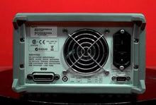 Load image into Gallery viewer, Agilent E3631A Triple Output DC Power Supply 0-6V/5A, 0-25V/1A - ZYYKZ Test Equipment