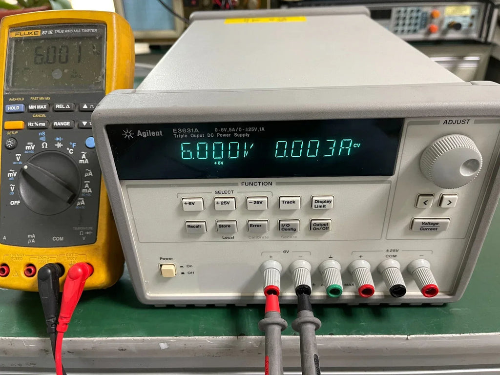 Agilent E3631A Triple Output Programmable DC Power Supply 0-6V/5A & 0-25V/1A - ZYYKZ Test Equipment
