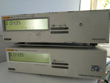 Load image into Gallery viewer, Fluke 910 GPS Controlled OCXO Frequency Standard Clock - ZYYKZ Test Equipment