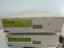 Load image into Gallery viewer, Fluke 910 GPS Controlled OCXO Frequency Standard Clock - ZYYKZ Test Equipment
