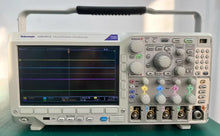 Load image into Gallery viewer, Tektronix MDO3014 4-Channel Mixed Domain Oscilloscope 100 MHz Bandwidth 2.5 GS/s Sample Rate - ZYYKZ Test Equipment