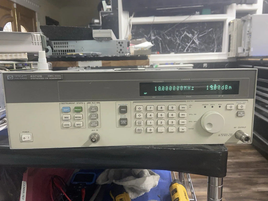 Agilent HP 83712B Signal Generator 0.01-20 GHz with Calibration & Options 1e1, 1e5, 1e8 Attenuator - ZYYKZ Test Equipment