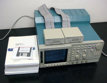 Load image into Gallery viewer, Tektronix 200MHz 16-Bit 2-Channel Arbitrary Waveform Generator - ZYYKZ Test Equipment