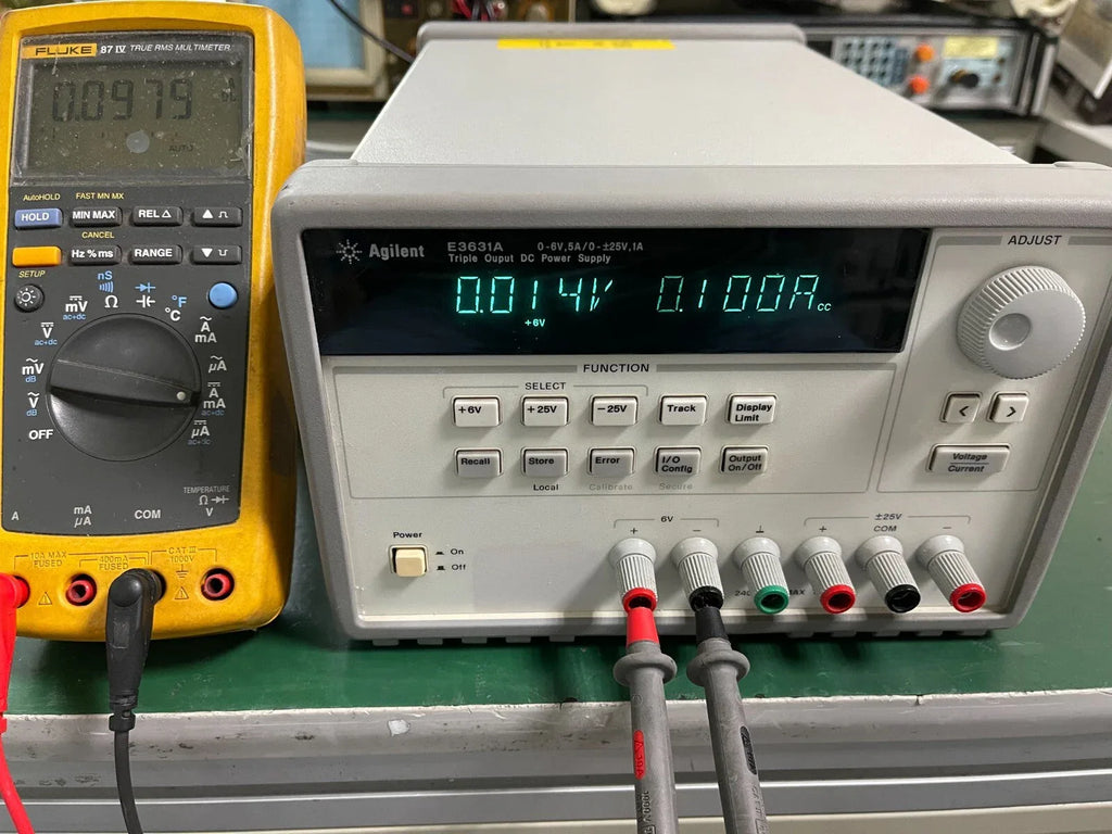 Agilent E3631A Triple Output Programmable DC Power Supply 0-6V/5A & 0-25V/1A - ZYYKZ Test Equipment
