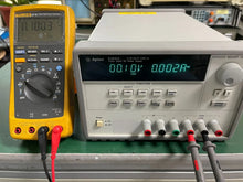 Load image into Gallery viewer, HP Agilent E3631A Triple Output DC Power Supply 0-6V/5A &amp; 0-25V/1A - ZYYKZ Test Equipment