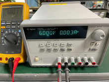 Load image into Gallery viewer, HP Agilent E3631A Triple Output DC Power Supply 0-6V/5A &amp; 0-25V/1A - ZYYKZ Test Equipment