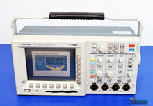 Load image into Gallery viewer, Tektronix TDS 3034 300MHz 4-Channel Digital Phosphor Oscilloscope - NIST Calibrated
